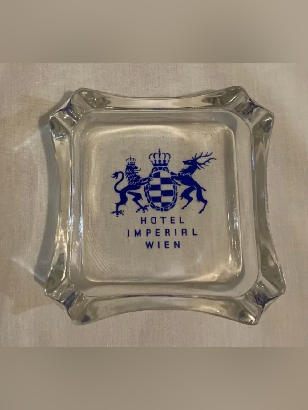 Clear Glass Ashtray with Blue Logo